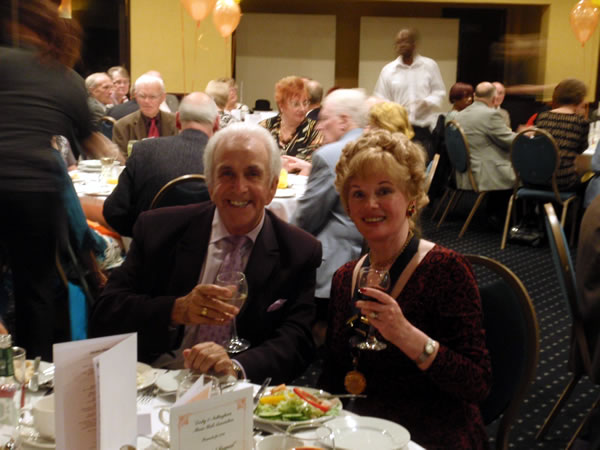 Image of Caroline at lunch with Don Maclean