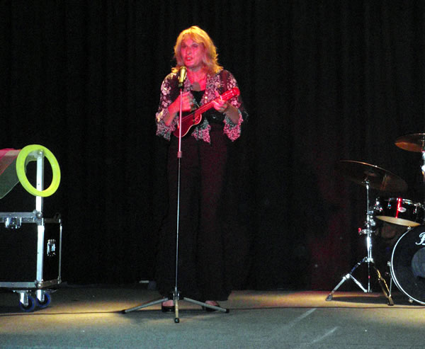 Gabriella on stage with her little Ukulele in her hand